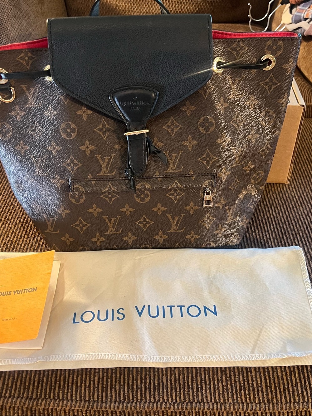 Louis Vuitton Monogram Canvas Backpack with Black Trim and Red Interior